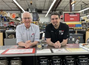 two men over a counter