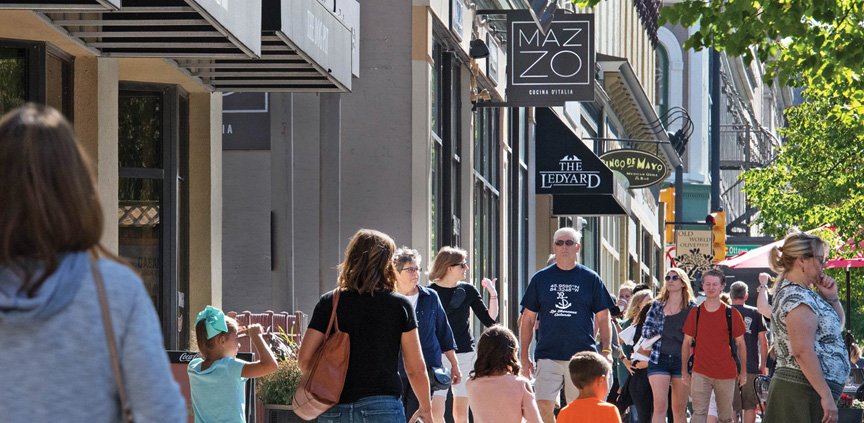 crowd walking down the street