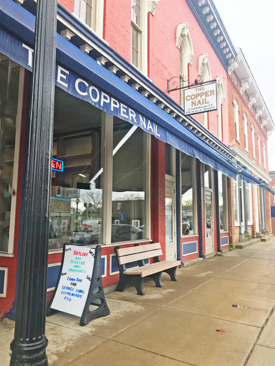 copper nail shop from street