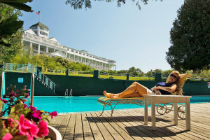 woman lounging by the pool