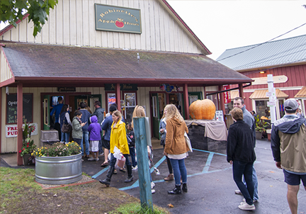 Visitors line up outside of Robinette's Apple Haus & Winery