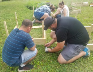 VIP Volunteers frame houses