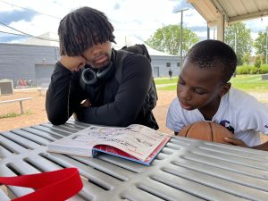 students outdoor reading